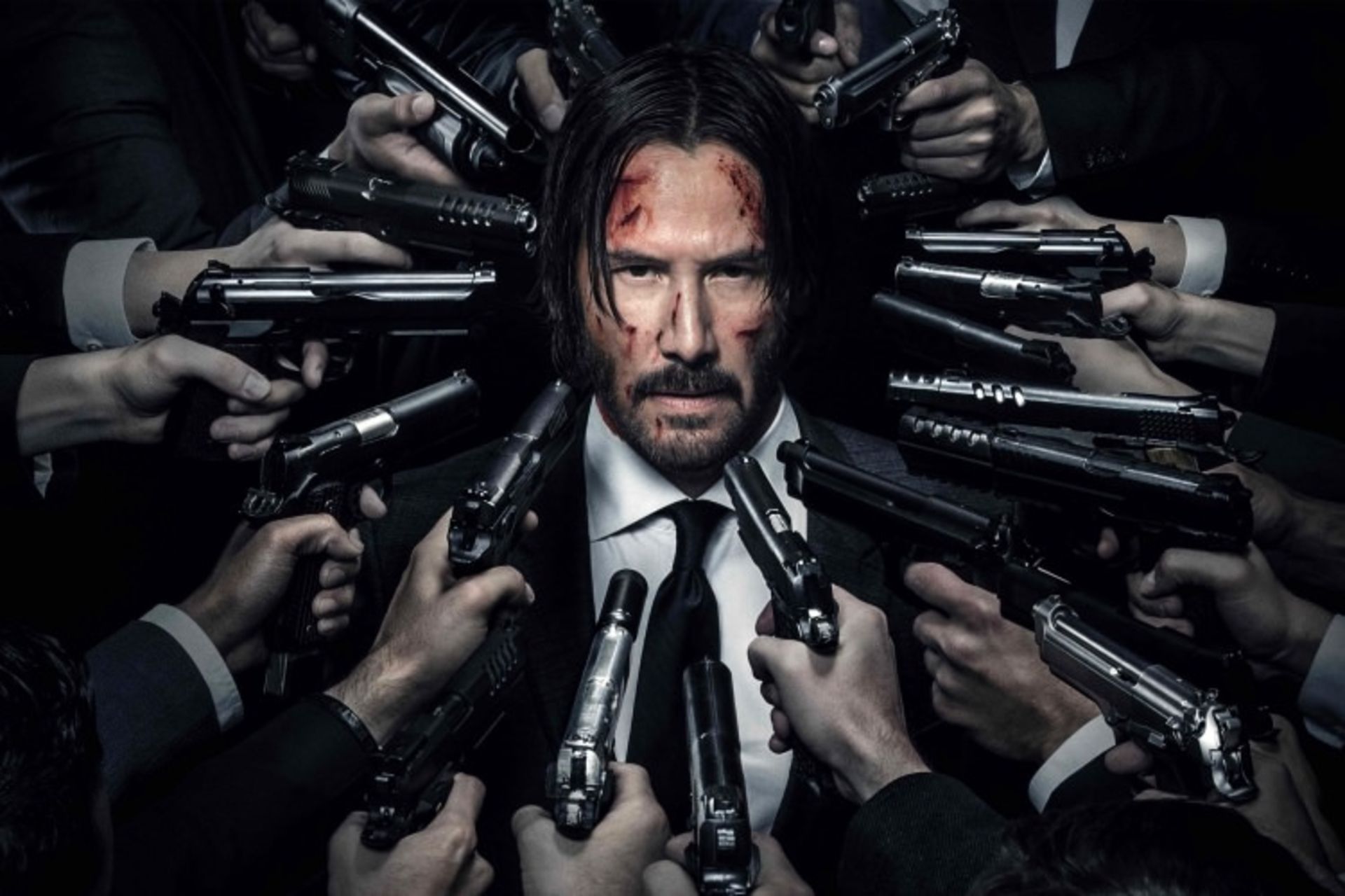 صورت شخصیت جان ویک در میان چندین اسلحه John Wick: Chapter 2