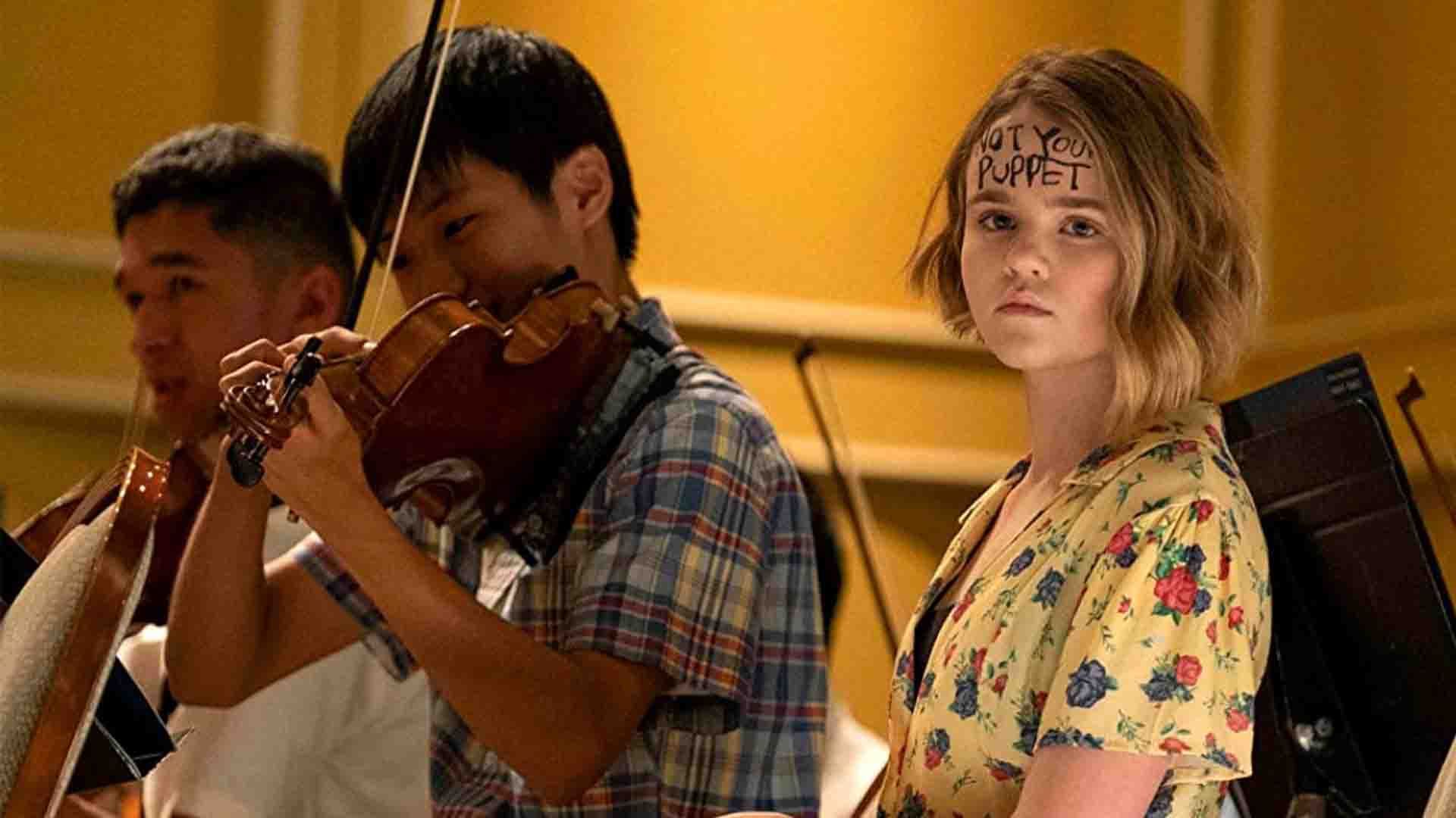 2020-11-little-fires-everywhere-megan-stott-playing-violon