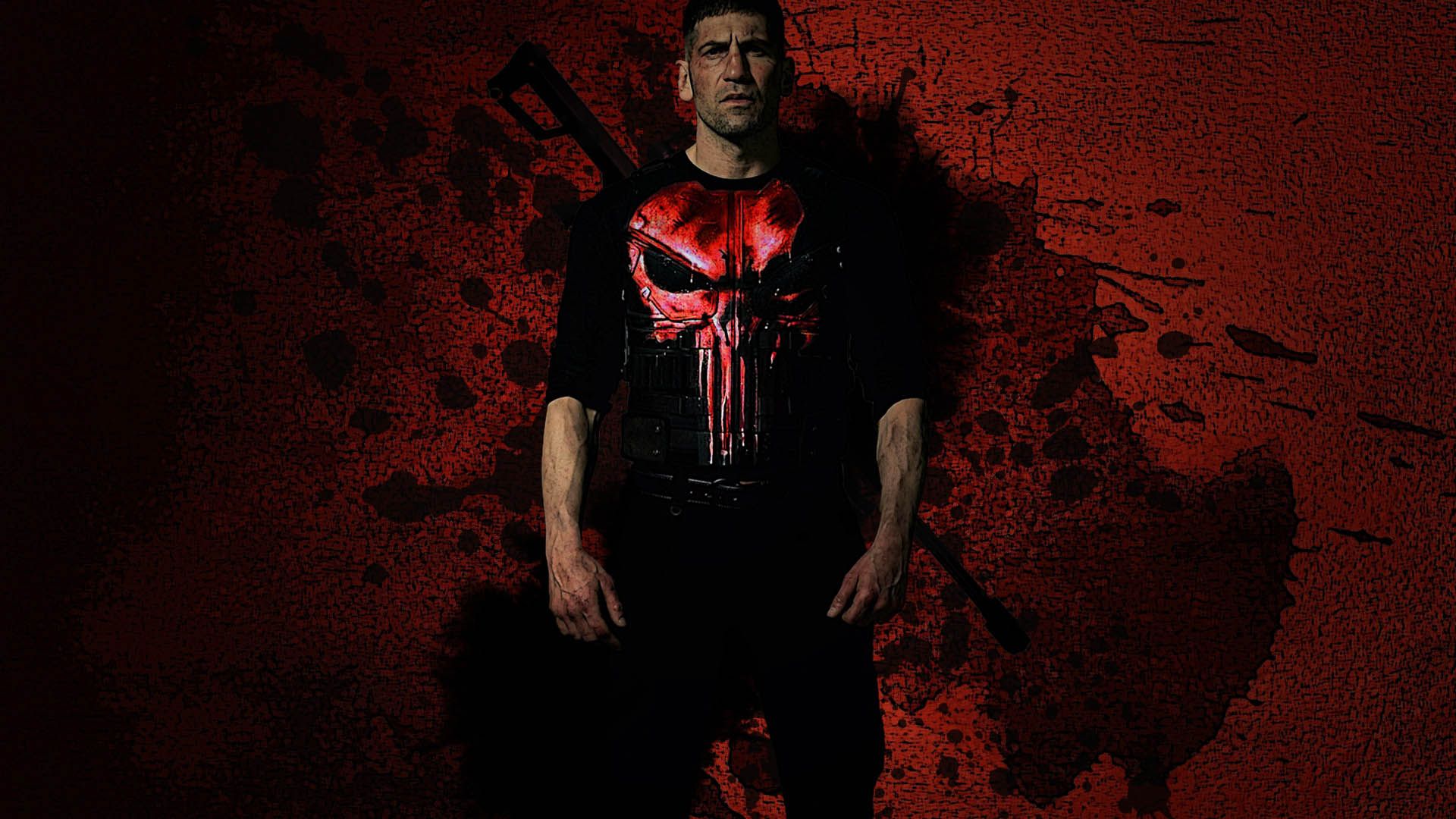 شخصیت فرانک کسل با بازی جان برنتال با پس زمینه قرمز رنگ کاور سریال punisher