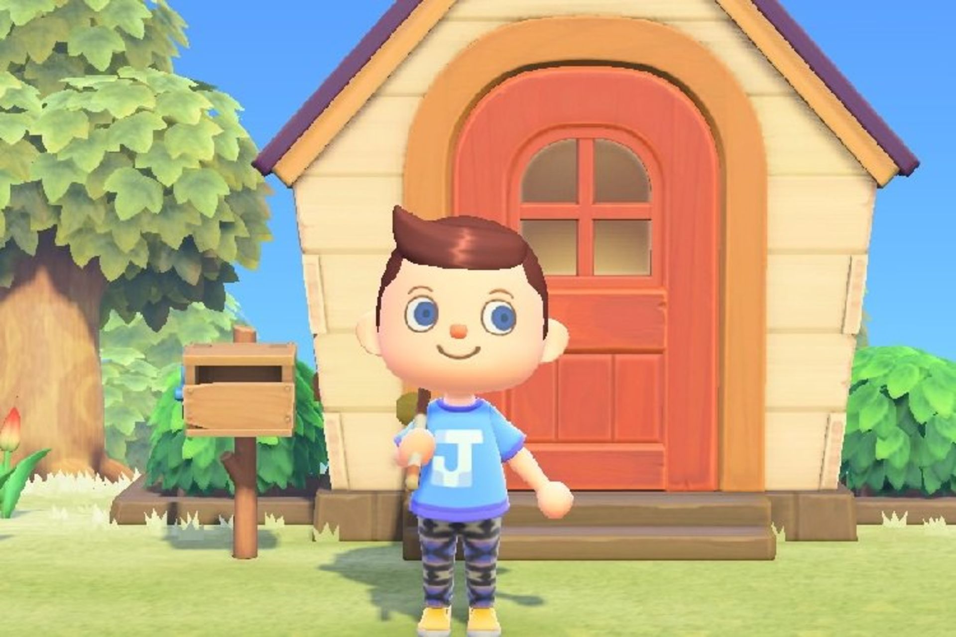 کاراکتر Animal Crossing: New Horizons ایستاده روبه‌روی خانه خود