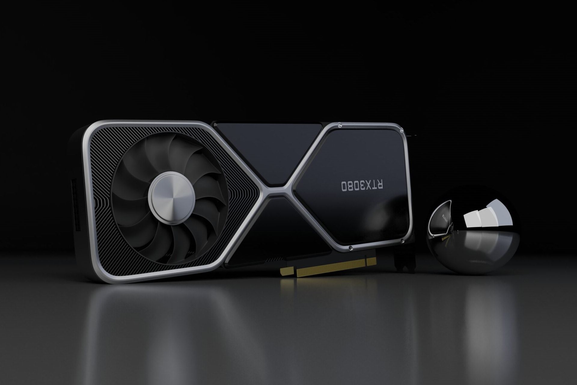 کارت گرافیک انویدیا RTX 3080 در کنار یک گوی فلزی