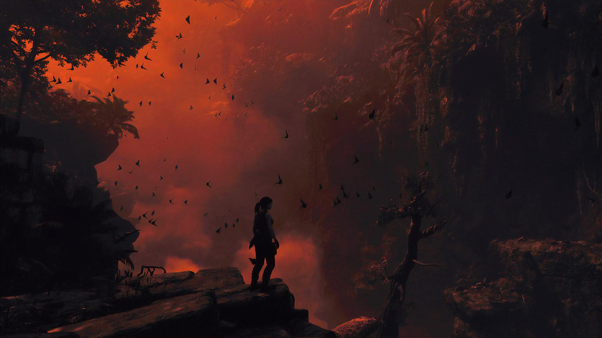 لارا کرافت ایستاده در غروب جنگل در بازی توم ریدر / Tomb Raider