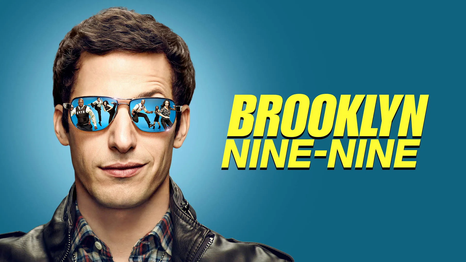 کاور سریال Brooklyn Nine-Nine و تصویری از اندی سمبرگ با عینک دودی
