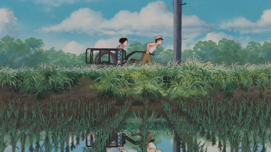 شخصیت سیتا و ستسوکو در مزرعه‌ای در حال کار در انیمه Grave of the Fireflies