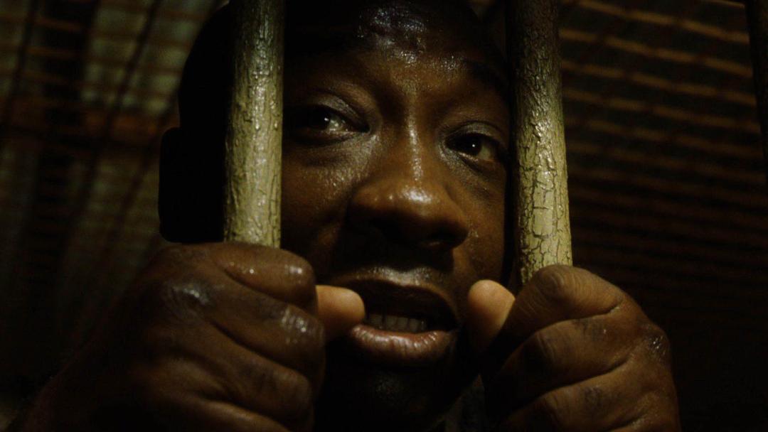 شخصیت جان کافی در یک سلول زندان در فیلم The Green Mile