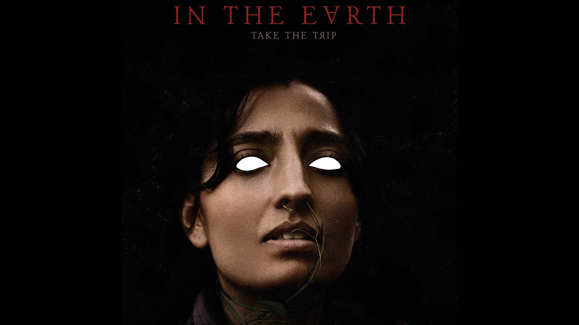 الورا تورچیا روی پوستر اصلی فیلم in the earth
