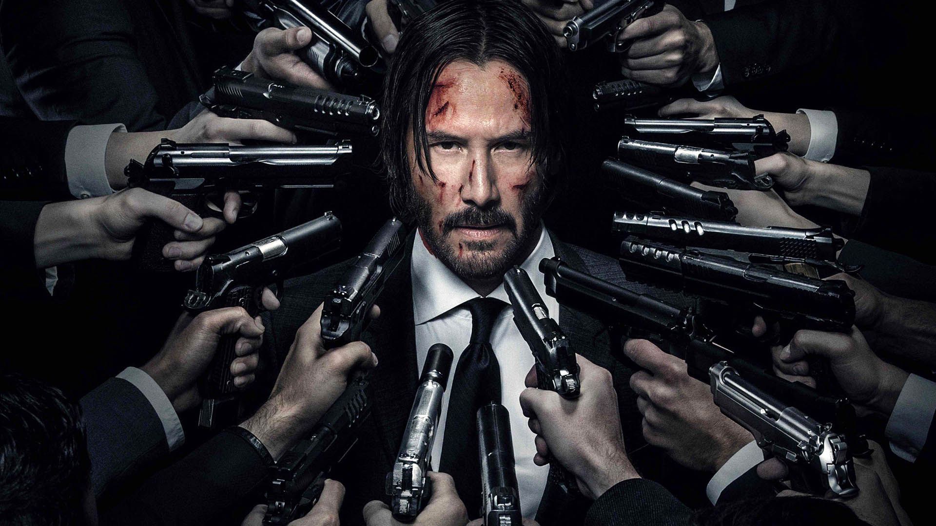 کاور فیلم john wick با تعداد زیادی اسلحه نشانه گرفته شده به سمت شخصیت جان ویک