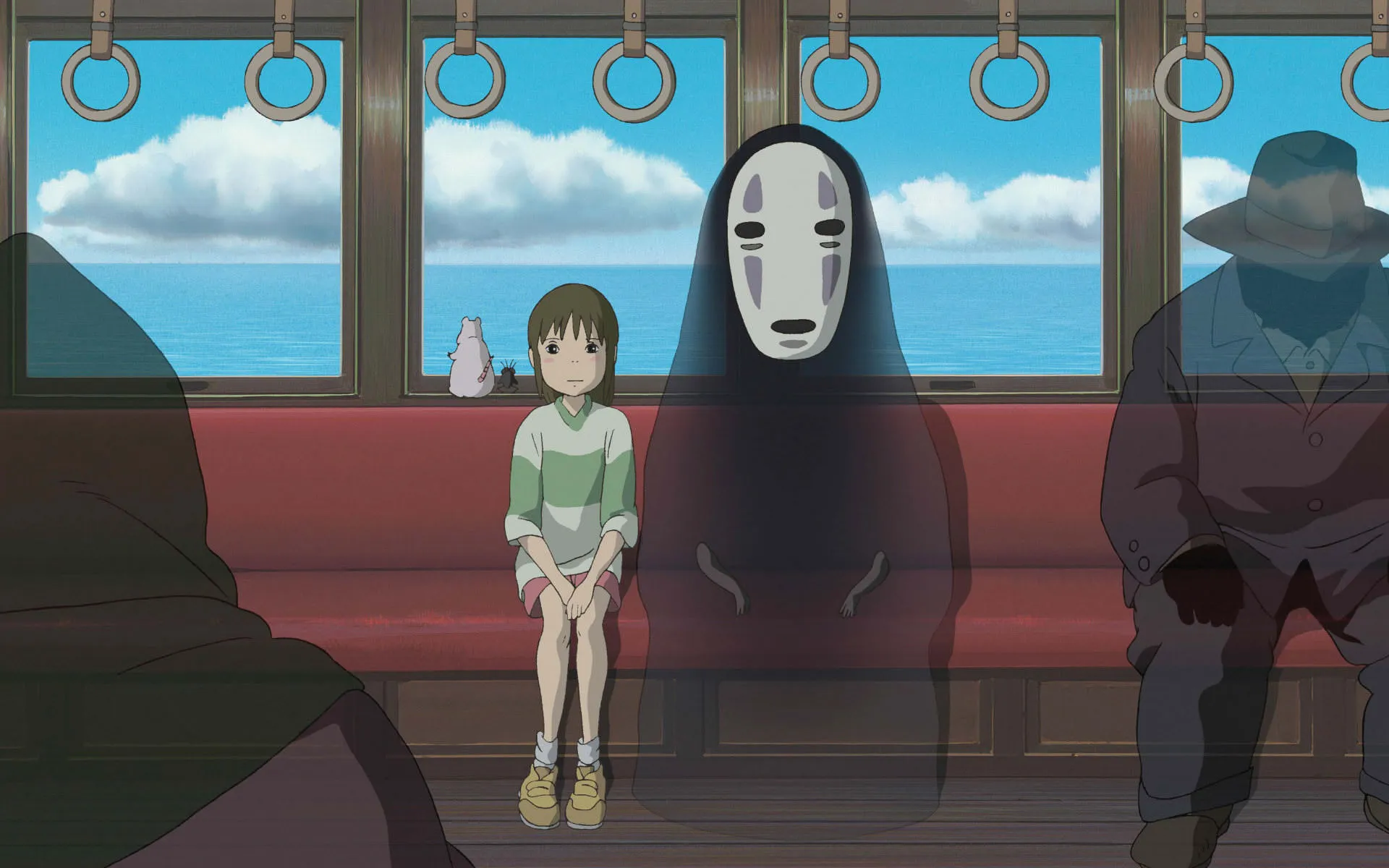 سن و بی‌چهره سوار بر قطار ارواح اسرارآمیز در انیمه Spirited Away 