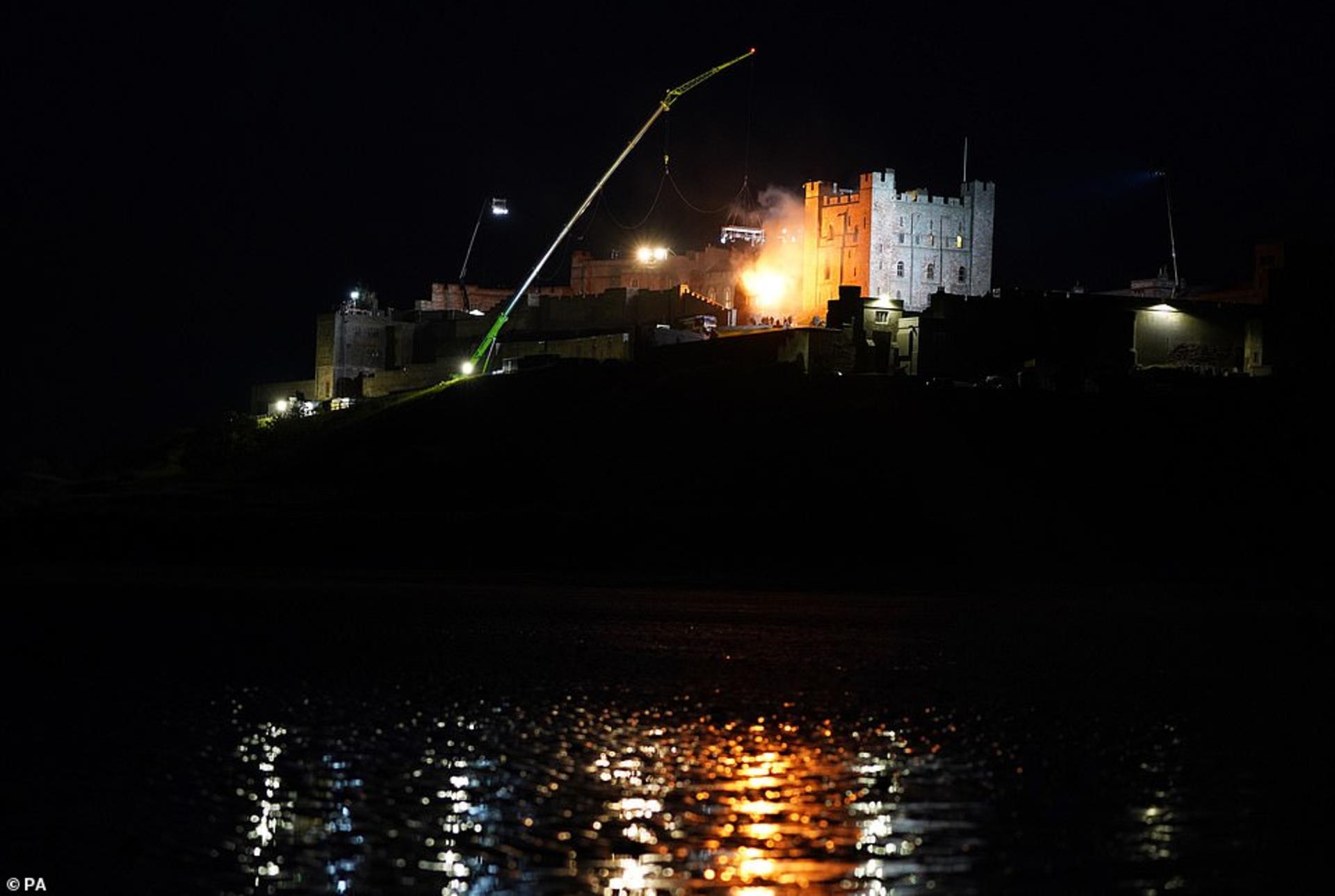 2021-6-indiana-jones-5-enormous-blaze-lights-sky-special-effects-crew-stage-fire-bamburgh-castle-04