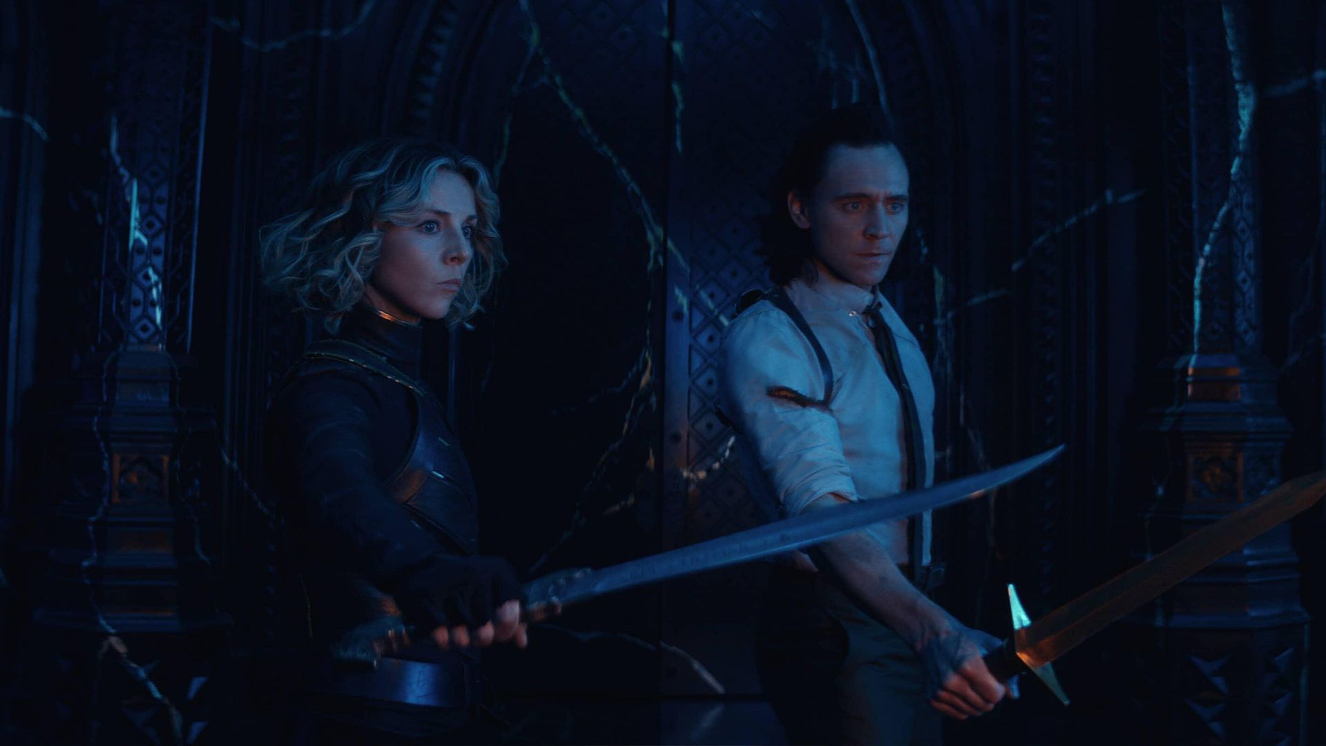 2021-7-loki-episode-6-tom-hiddleston-as-loki-sophia-di-martino-as-sylvie-swords