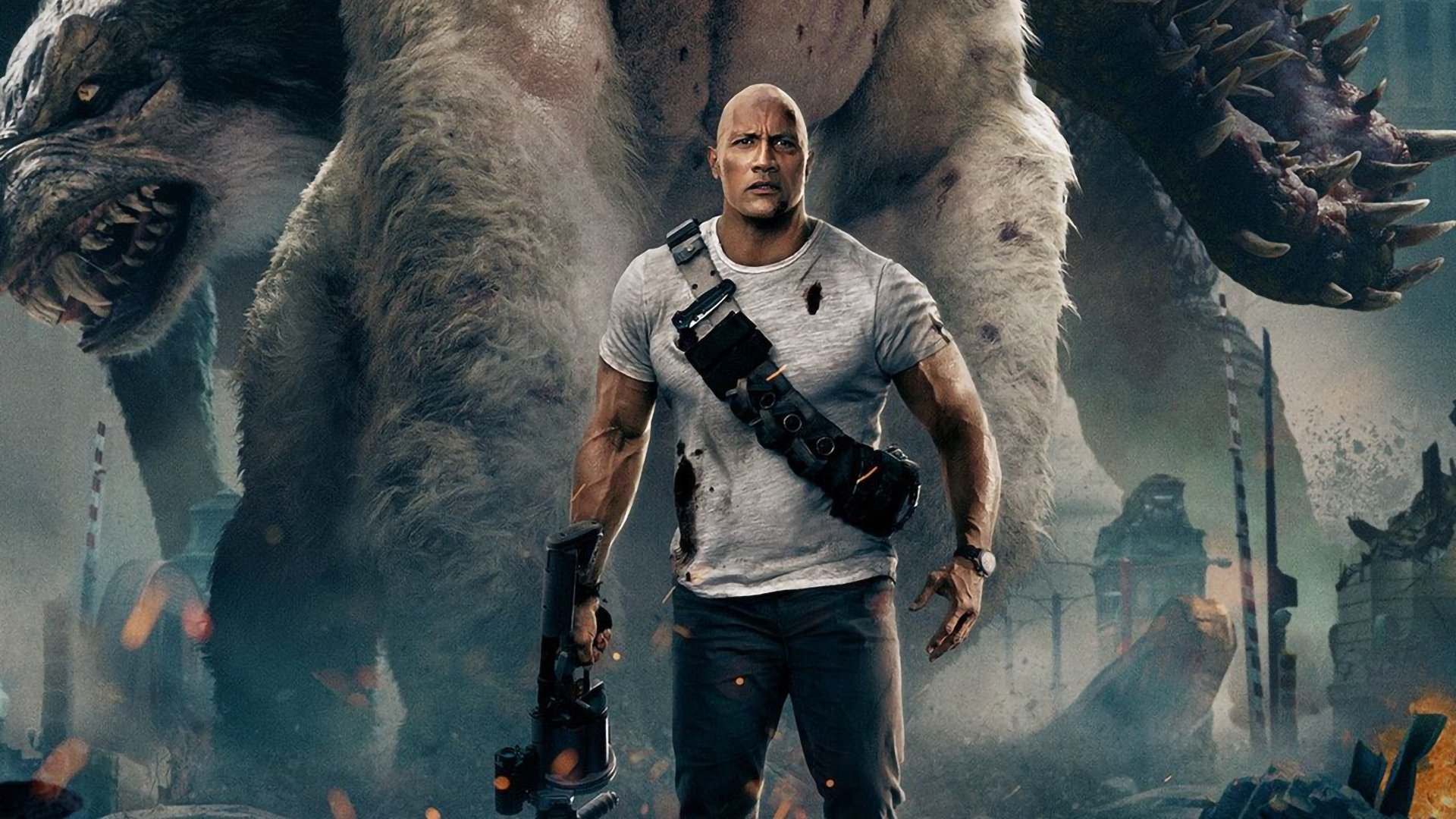 دواین جانسون با اسلحه‌ای در دست در فیلم Rampage