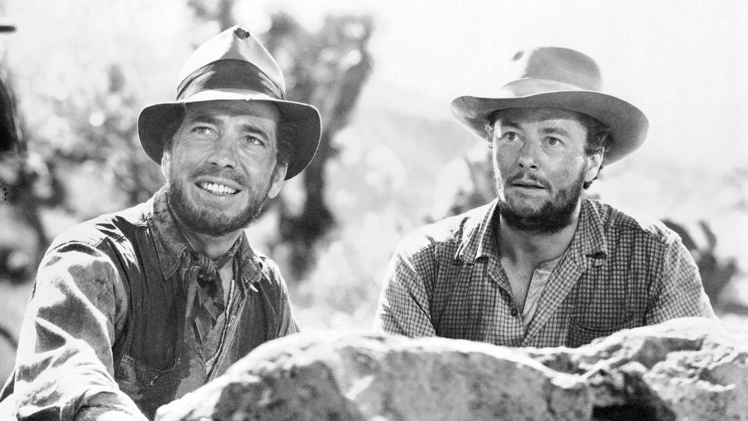 تصویر سیاه و سفید دو شخصیت از فیلم The Treasure of the Sierra Madre