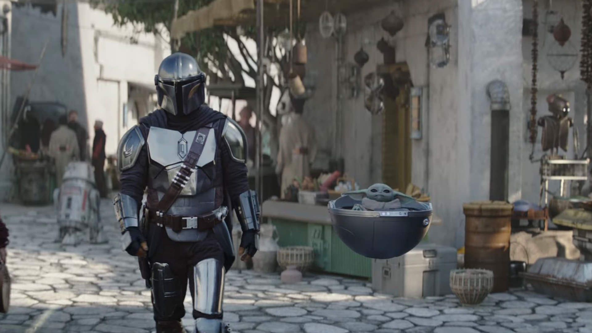 پیاده روی دین جارین به‌همراه گروگو در خیابان در فصل سوم سریال The Mandalorian