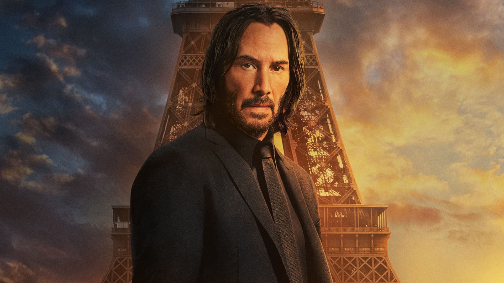 جان ویک با بازی کیانو ریوز در برابر برج ایفل در والپیپر فیلم John Wick: Chapter 4 