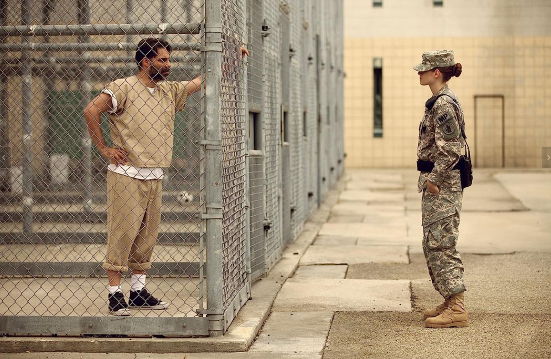 2023-7-camp-x-ray-prisoner-guard-looking-at-eachothers