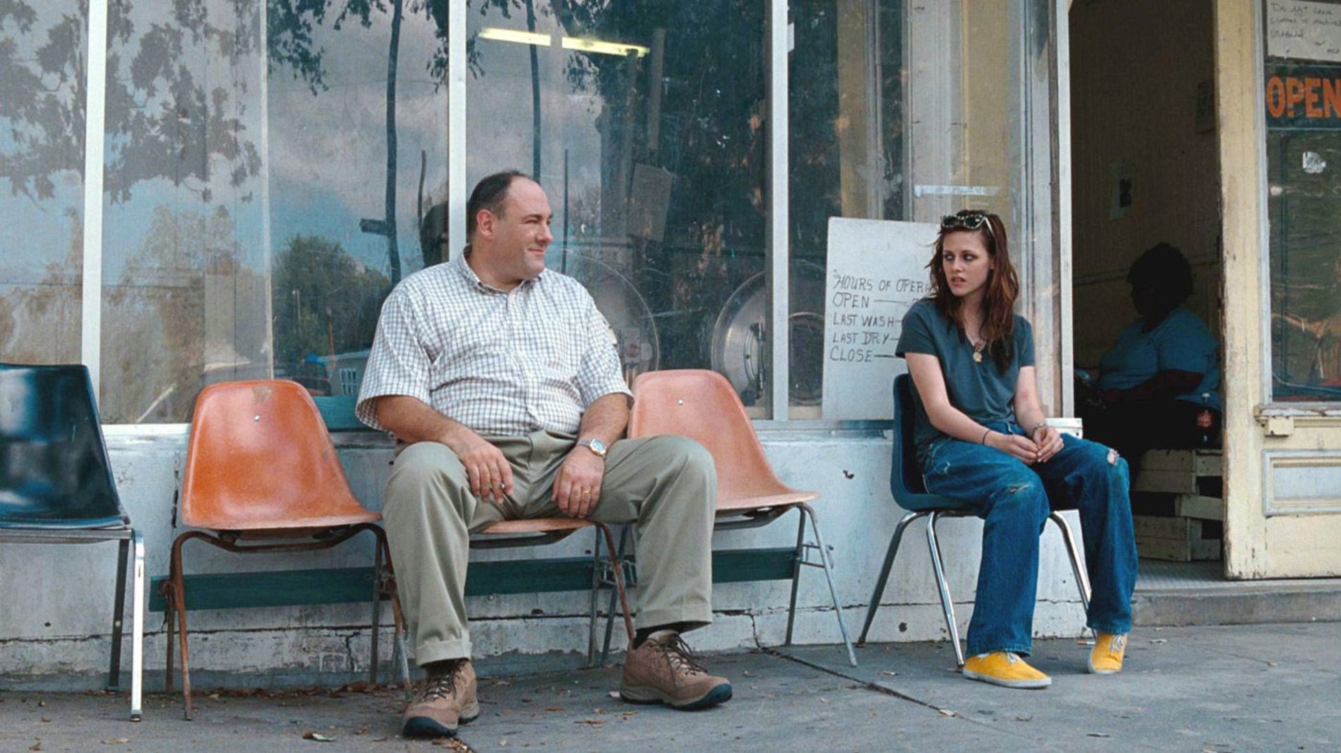 2023-7-welcome-to-the-rileys-gandolfini-kristen-sitting-on-chairs-talking