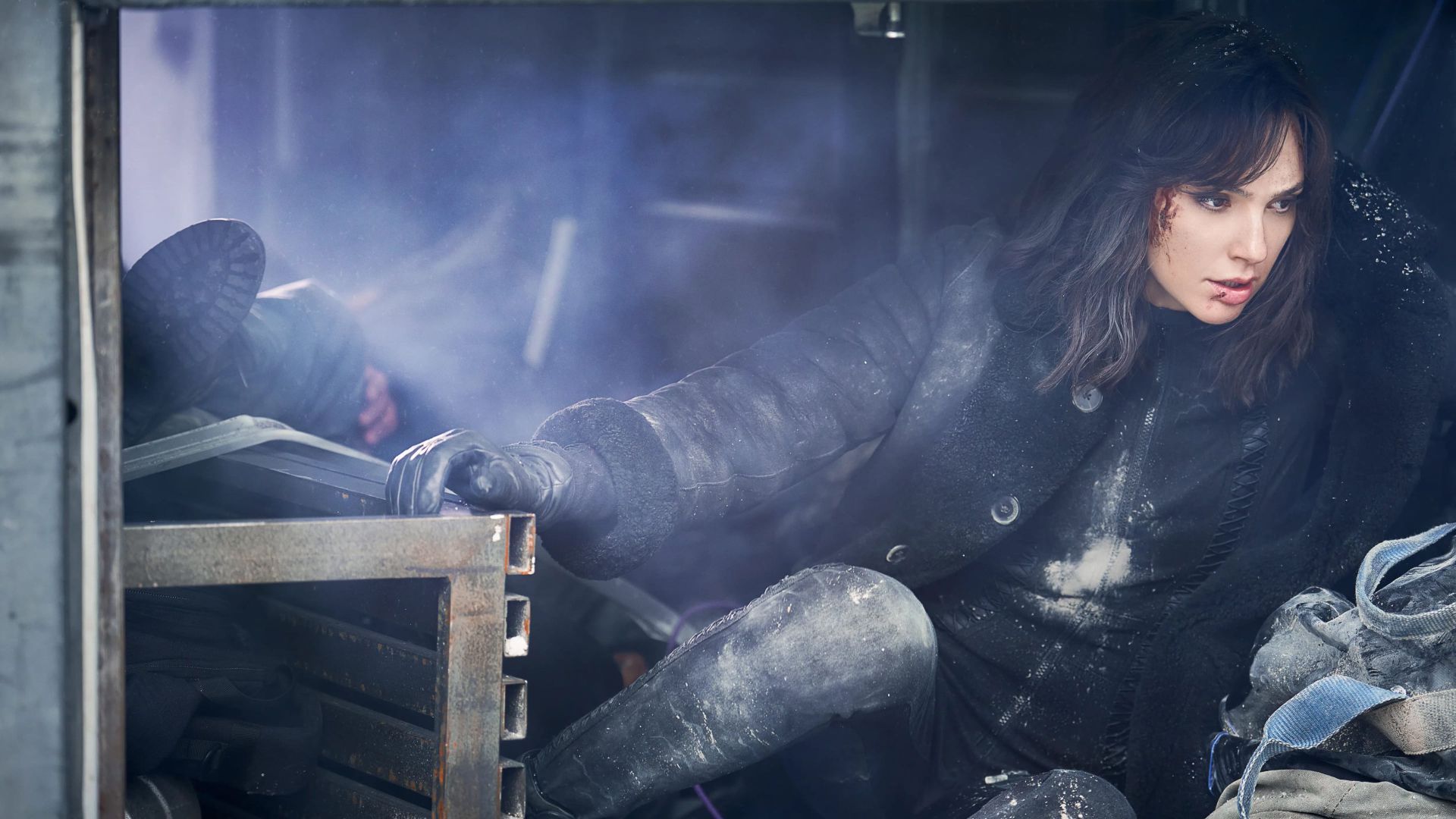 2023-8-heart-of-stone-gal-gadot-in-car-after-explosive