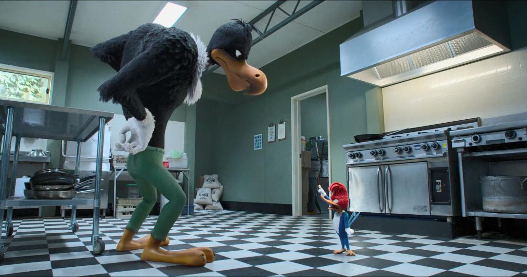 دارکوب زبله در برابر باز در آشپزخانه در فیلم Woody Woodpecker Goes to Camp