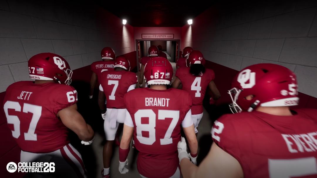 بازیکنان ورزش راگبی در حال ورود به زمین مسابقه در بازی EA Sports College Football 26