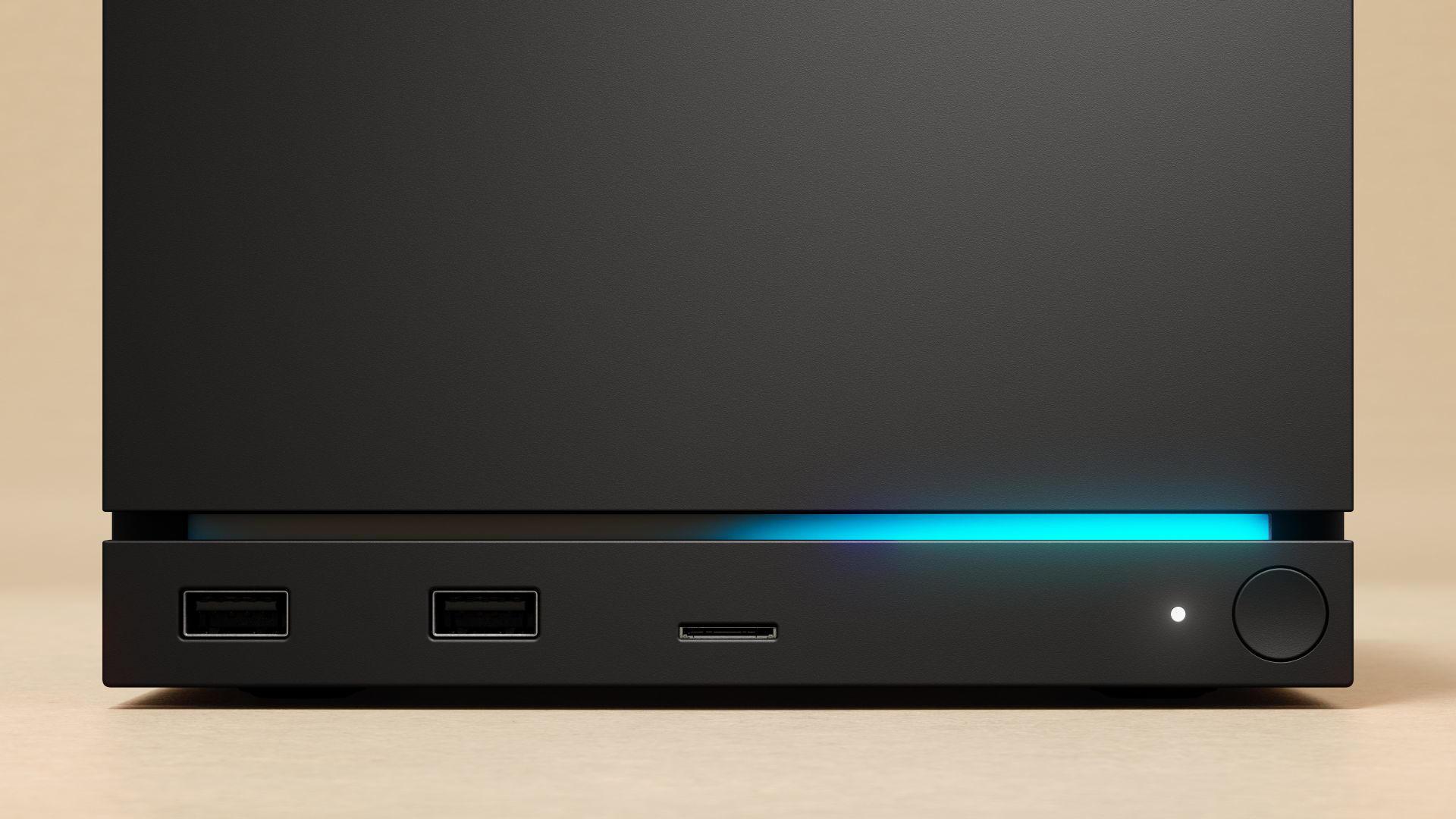 نمای نزدیک از پنل جلویی استیم ماشین با نورپردازی خطی آبی و درگاه‌های USB