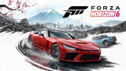 نمای هیجان‌انگیز از خودروهای قرمز و آبی در حال مسابقه در بازی Forza Horizon 6 با پس‌زمینه کوه فوجی و شهر ژاپن.