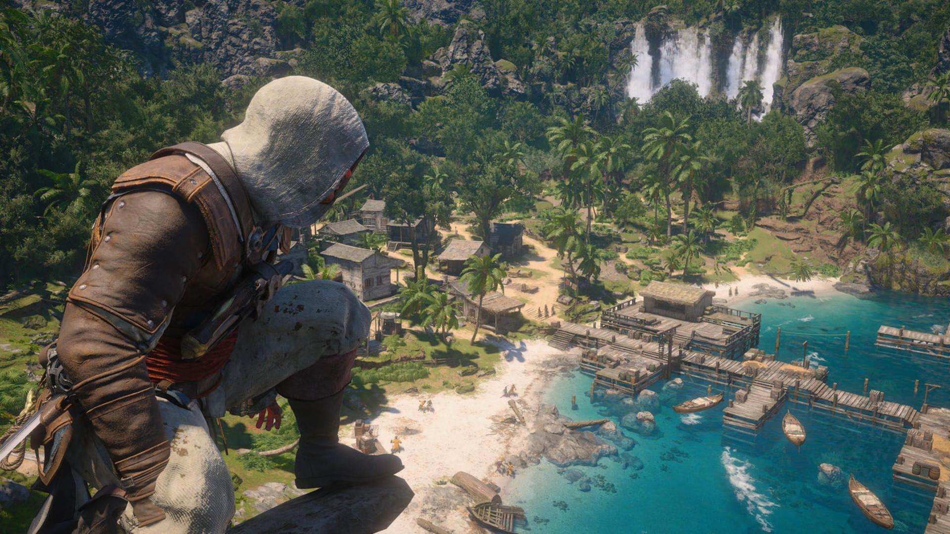 شخصیت اصلی بازی Assassin's Creed Black Flag Resynced بر فراز یک صخره به ساحل و دهکده‌ای در کنار آبشار خیره‌کننده نگاه می‌کند.