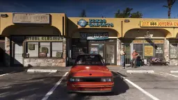 خودروی قرمز رنگ در مقابل فروشگاه‌های محلی در محیط بازی GTA VI (Grand Theft Auto VI)