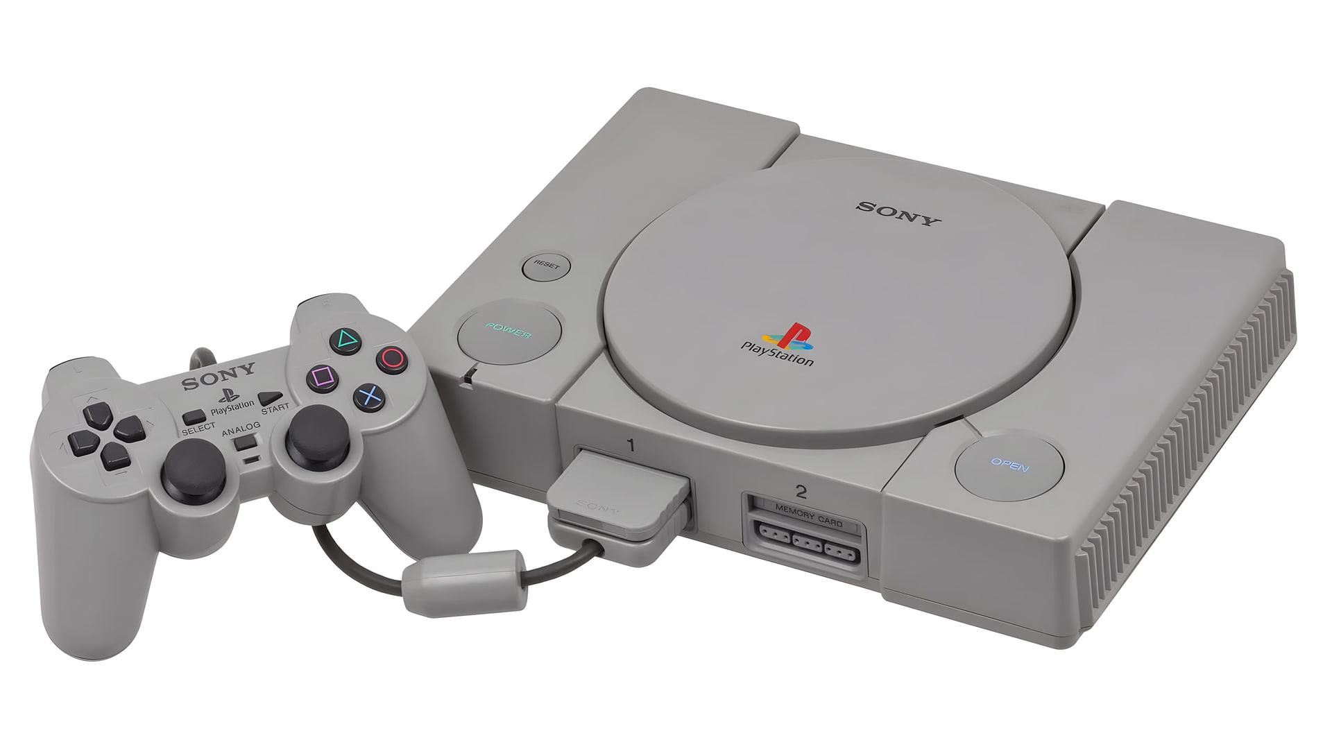 کنسول بازی پلی‌استیشن (PlayStation) به همراه دسته کنترل اصلی آن