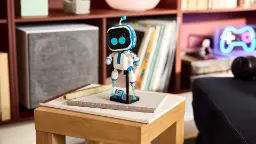 لگو آسترو بات (Astro Bot) روی یک میز چوبی قرار دارد