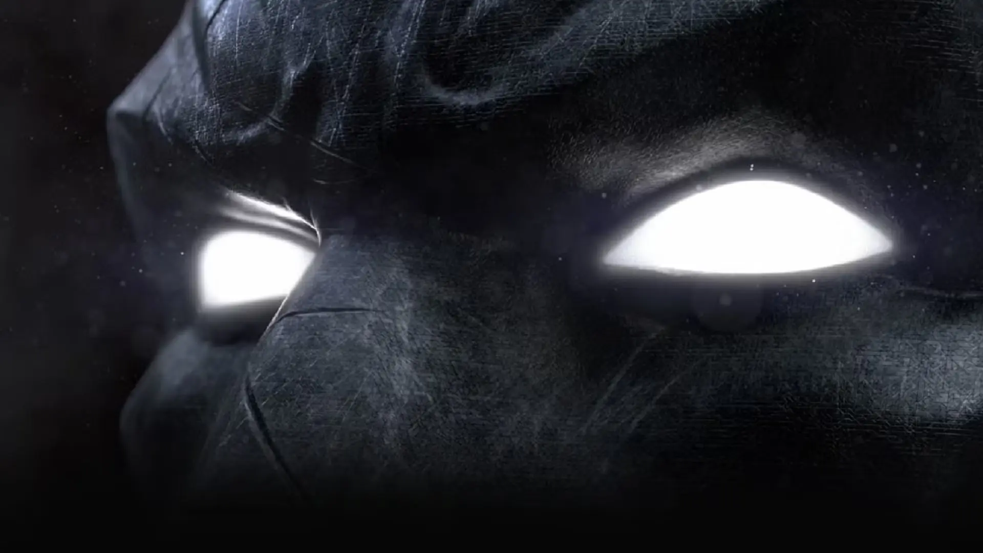 ماسک سیاه و بافت‌دار بتمن (Batman) با چشم‌های درخشان سفید