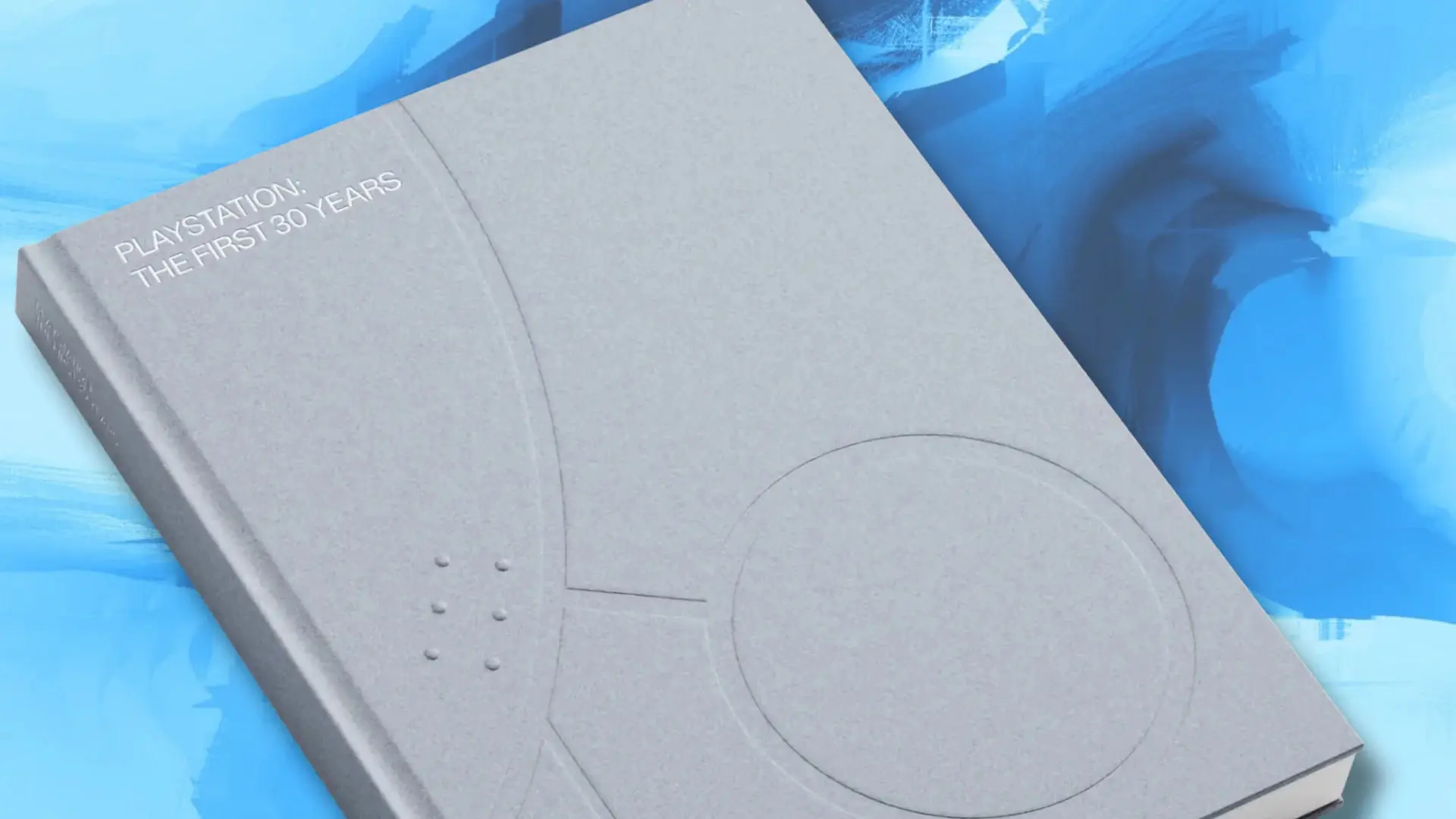 کتاب یادگاری ۳۰ سالگی پلی‌استیشن (PlayStation) با جلد خاکستری