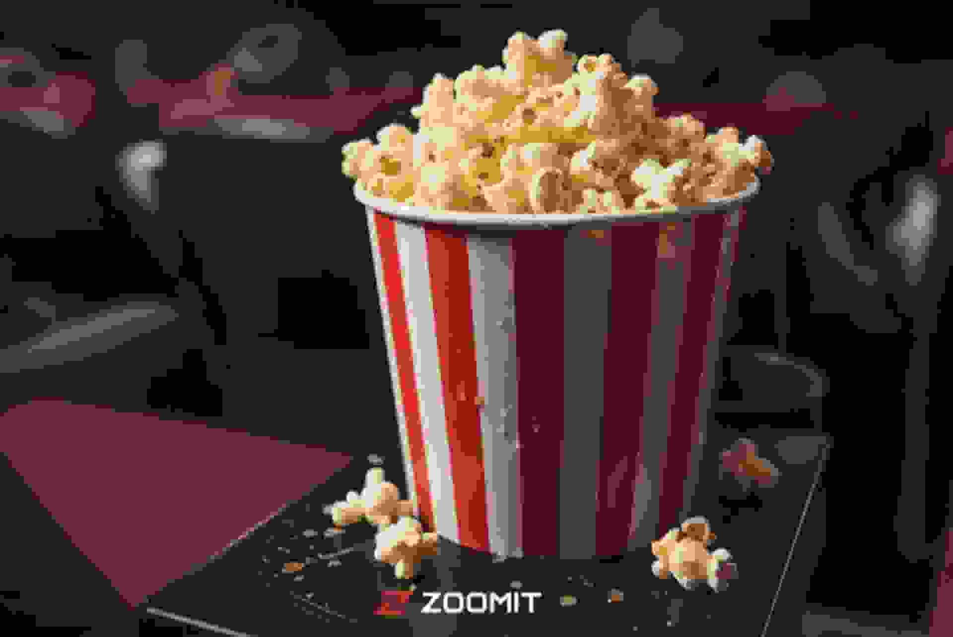 سطل پاپ‌کورن روی صندلی سینما
