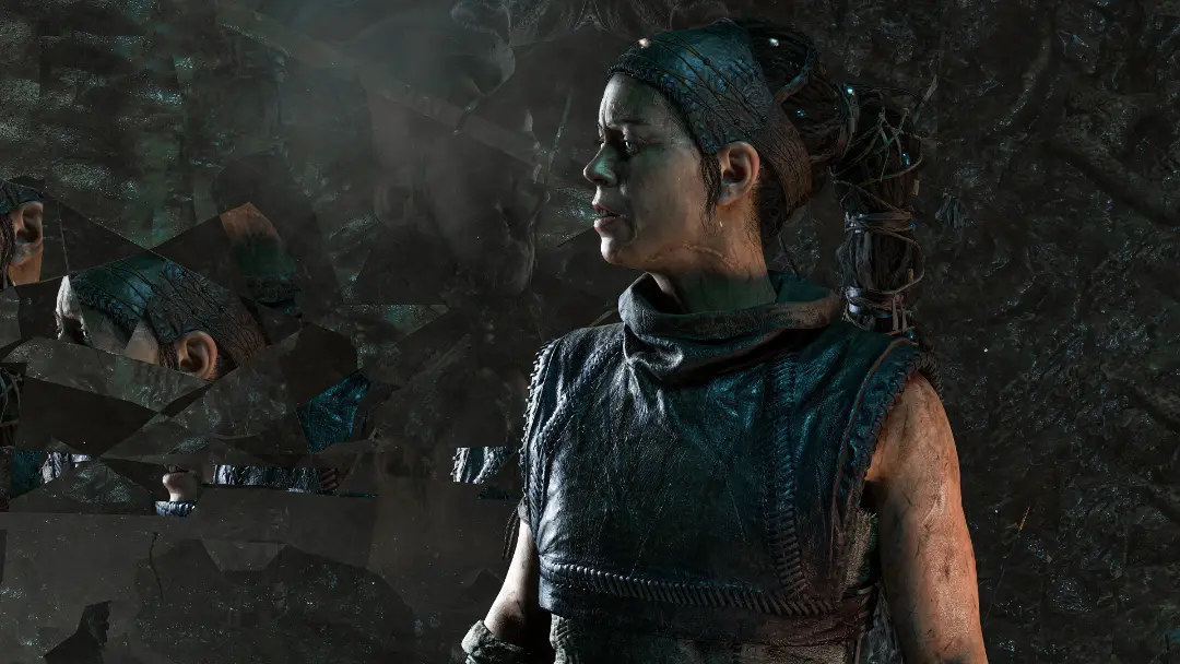 انعکاس چهره سنوئا (Senua) در آینه‌های شکسته در بازی Senua's Saga: Hellblade II