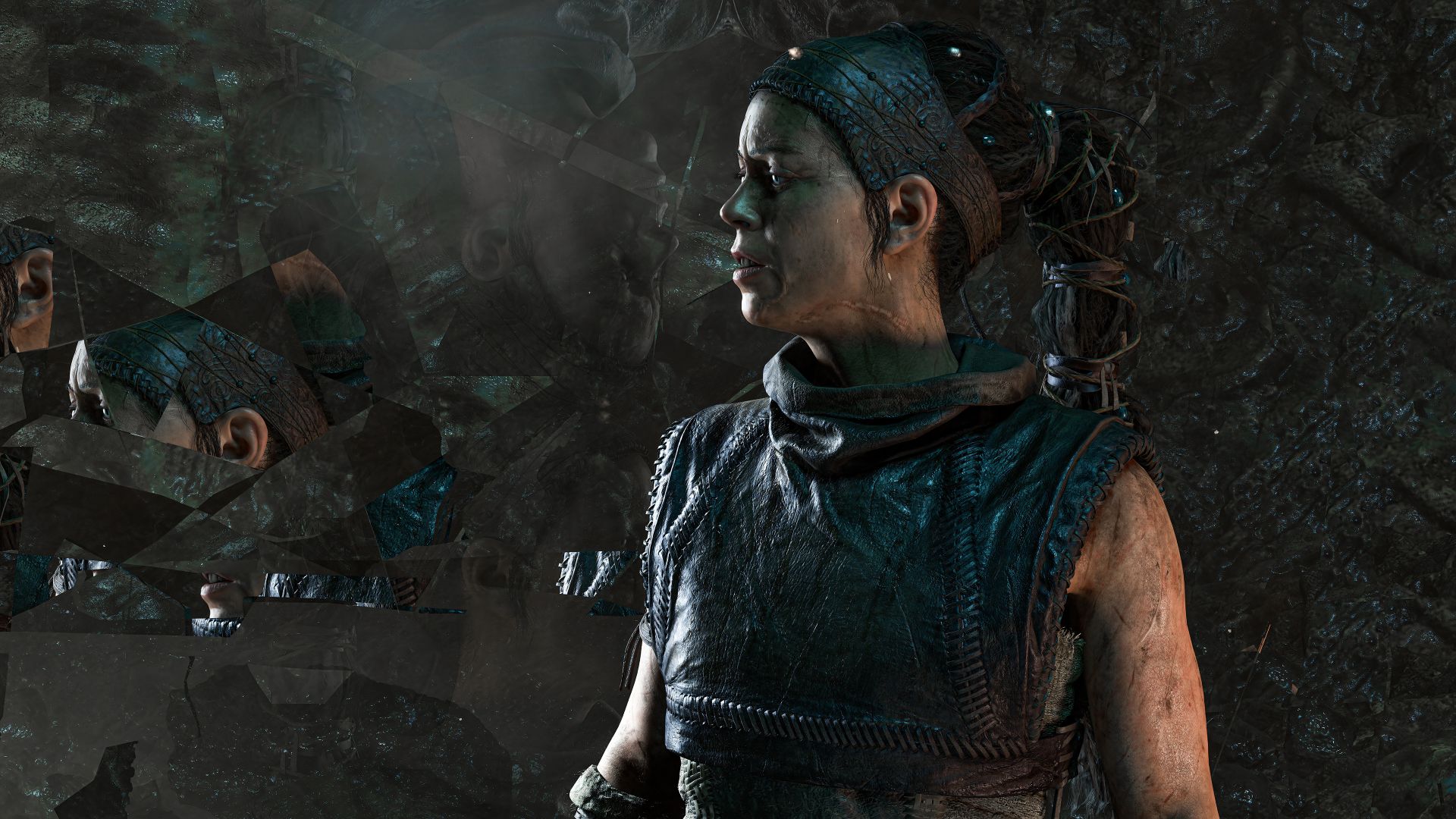 انعکاس چهره سنوئا (Senua) در آینه‌های شکسته در بازی Senua's Saga: Hellblade II