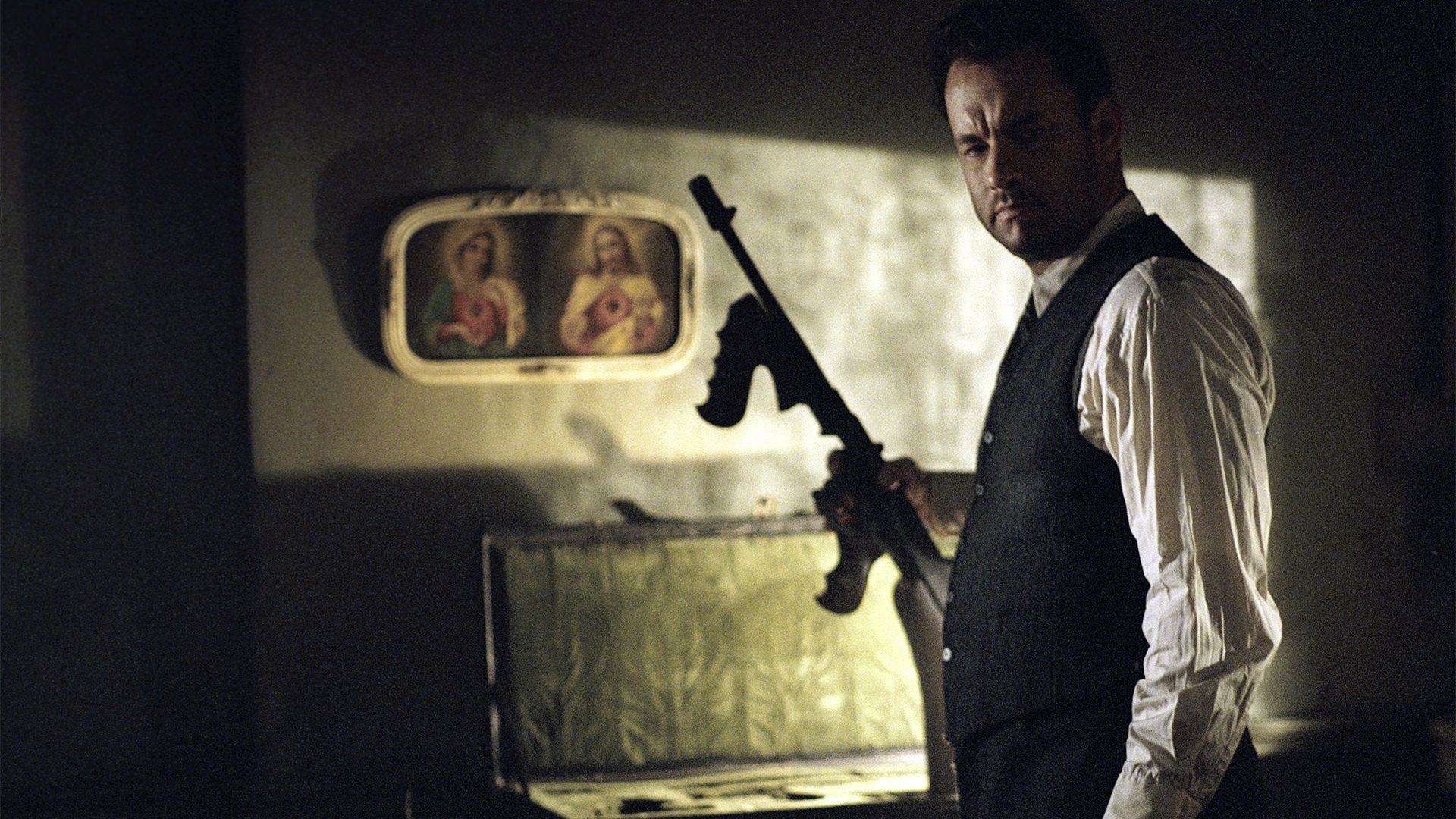 تام هنکس با اسلحه در فیلم Road To Perdition