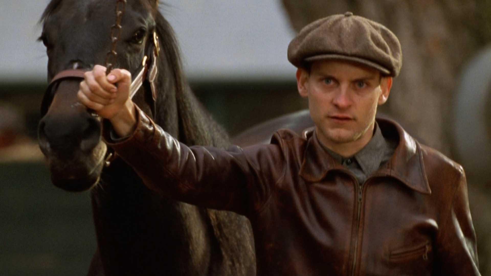 توبی مگوایر در کنار سی‌بیسکیت در فیلم Seabiscuit