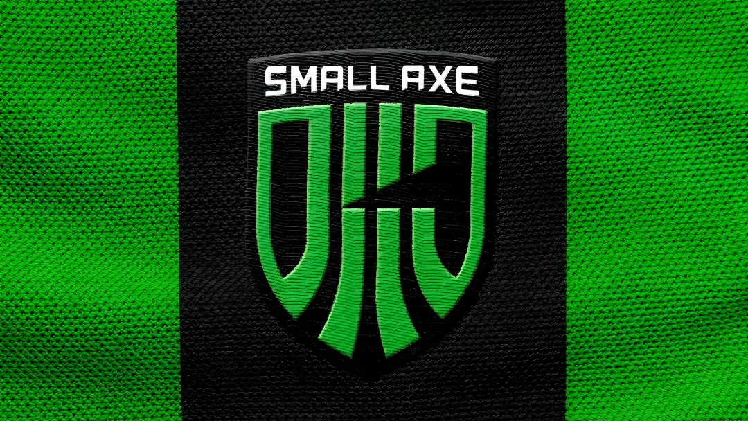لوگوی سبز و مشکی استودیوی بازی‌سازی Small Axe روی بافت پارچه‌ای