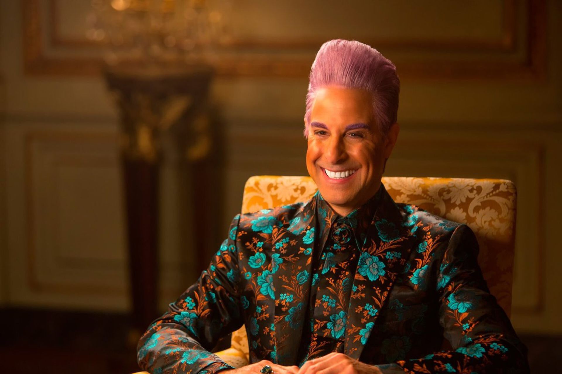 استنی توچی در نقش سزار فلیکرمن در فیلم The Hunger Games